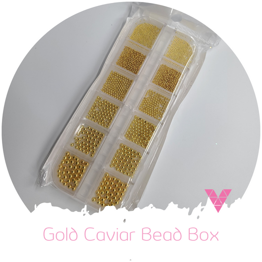 Caja de cuentas de caviar dorado